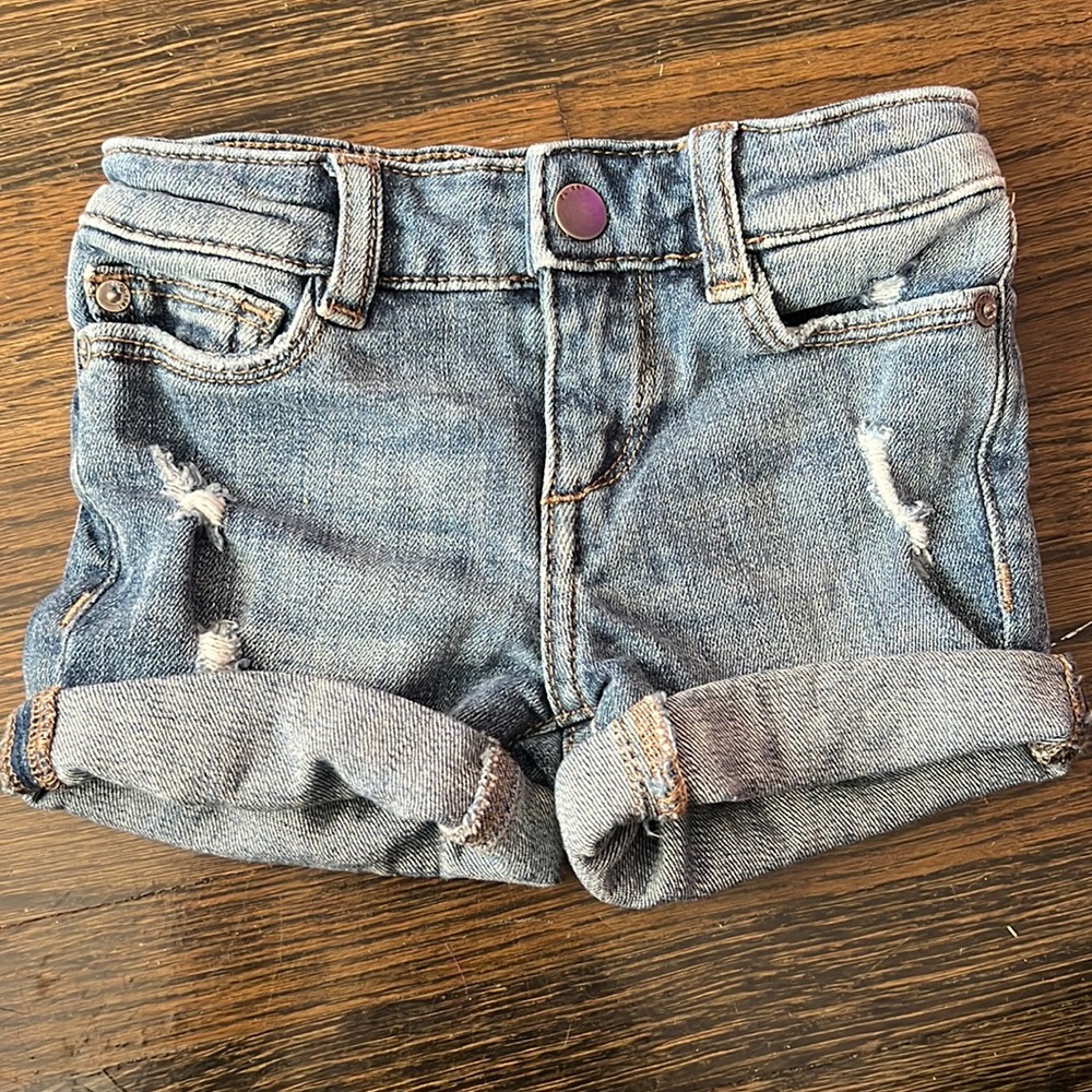 Cuffed denim shorts with rips